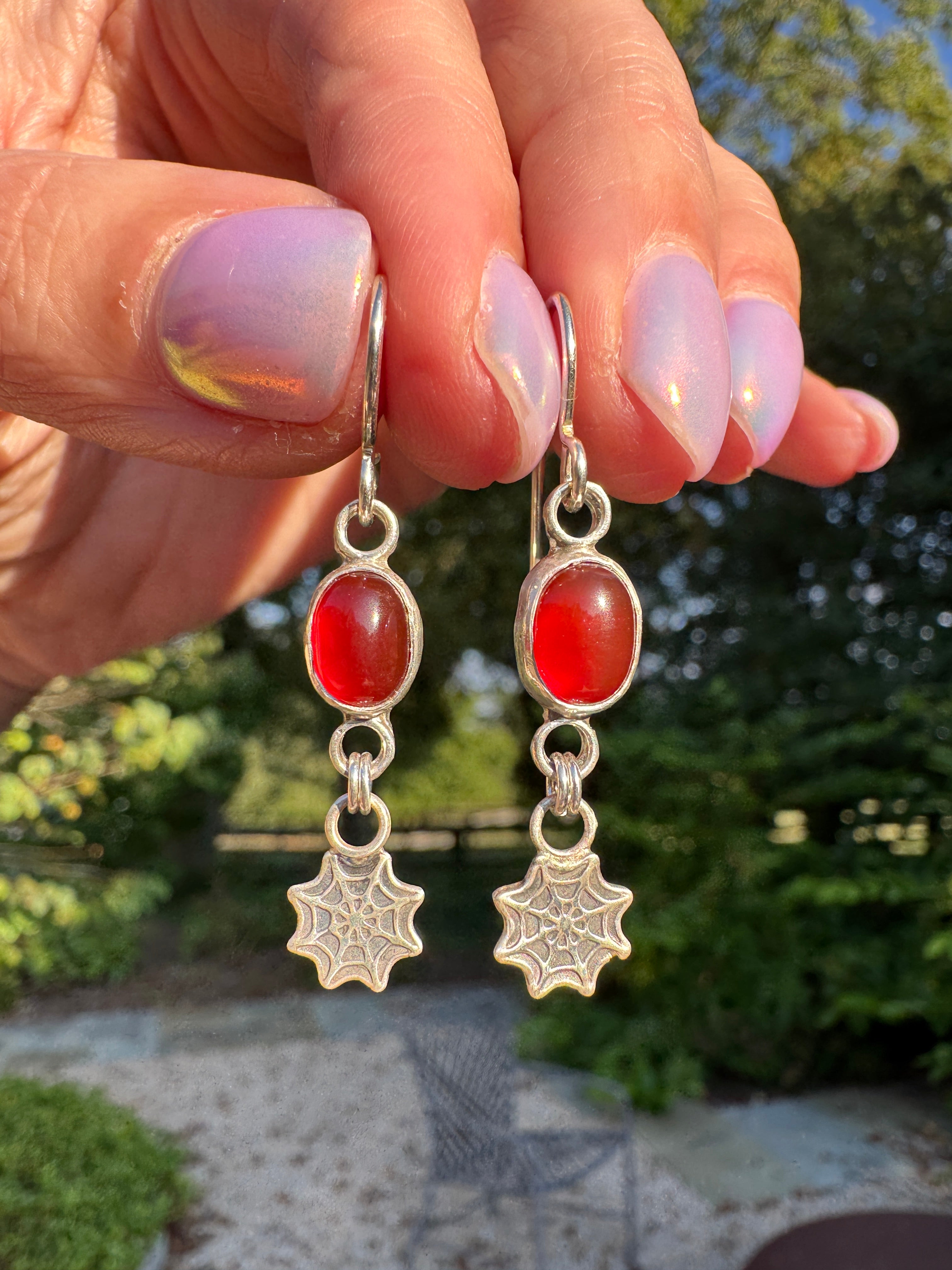 Sterling silver spider web earrings with carnelian. Halloween jewelry