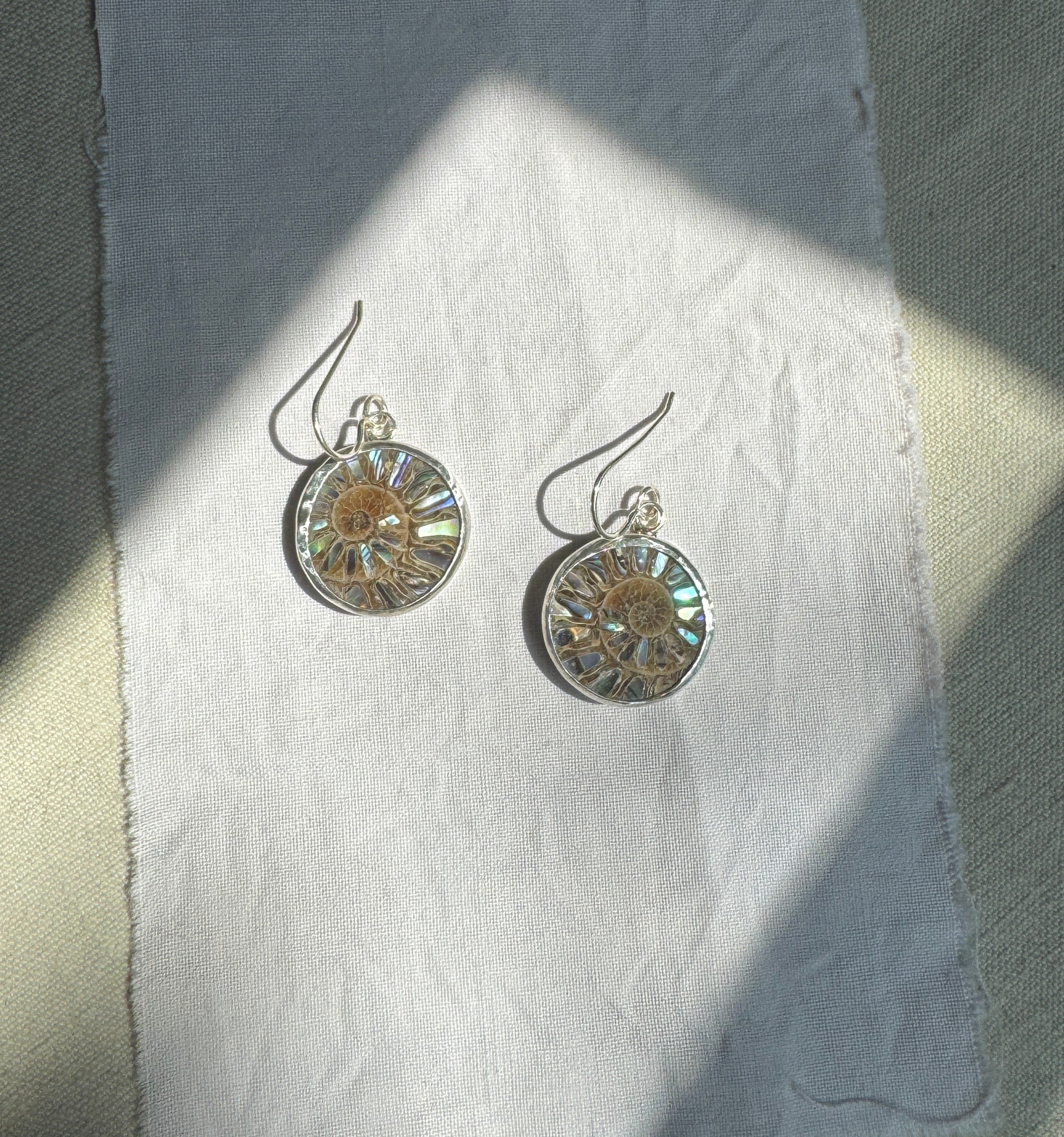 Abalone inlay on ammonite sterling silver earrings