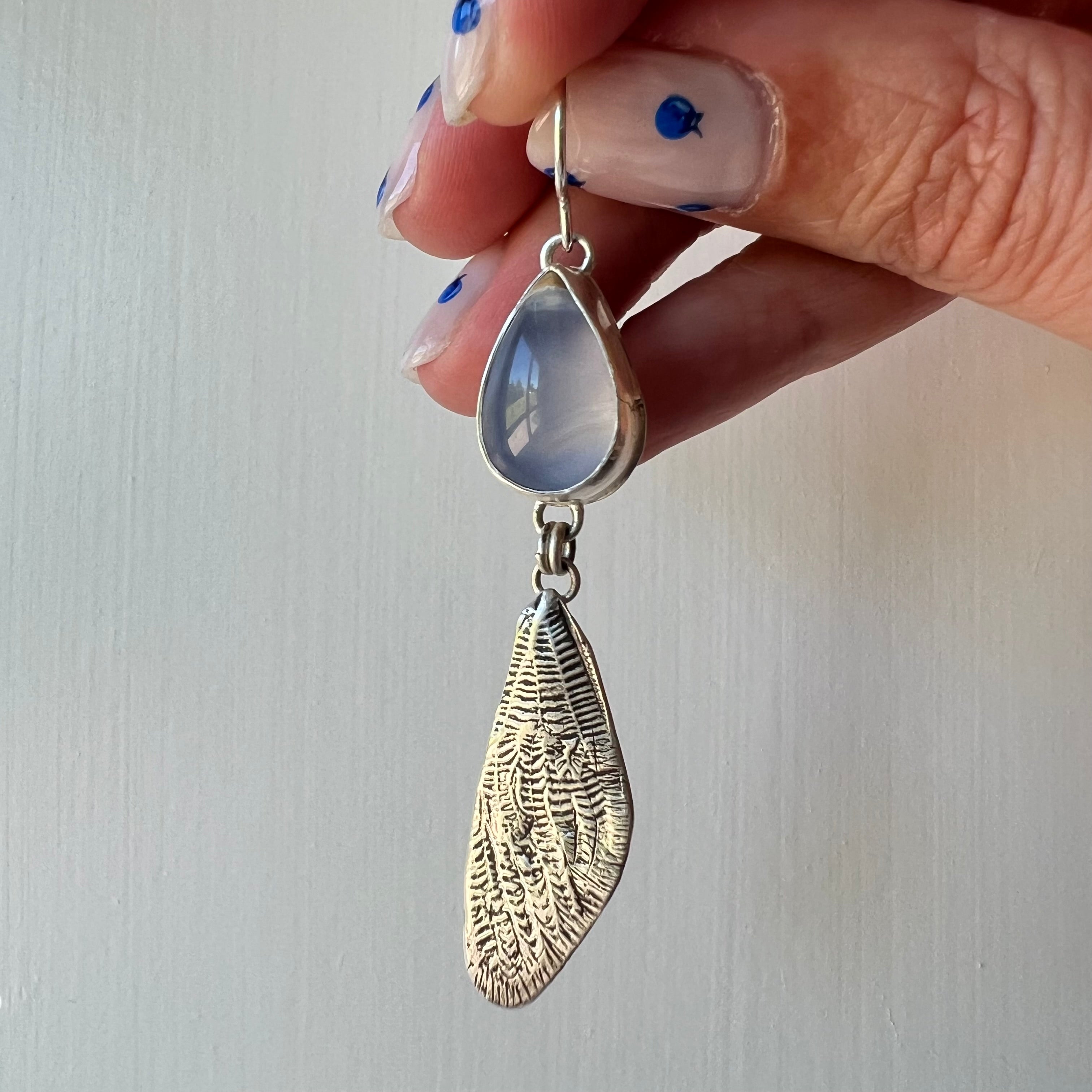 Sterling silver cicada wings with sparkling blue chalcedony. One of a kind pair.