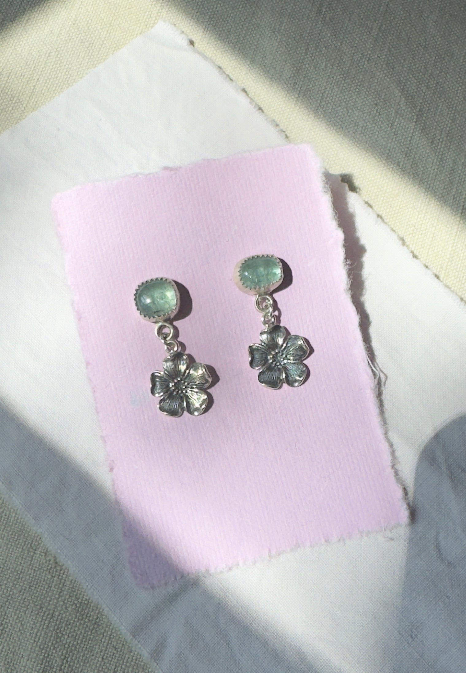 Beautiful blue toned tourmaline with sterling silver cherry blossoms post earrings