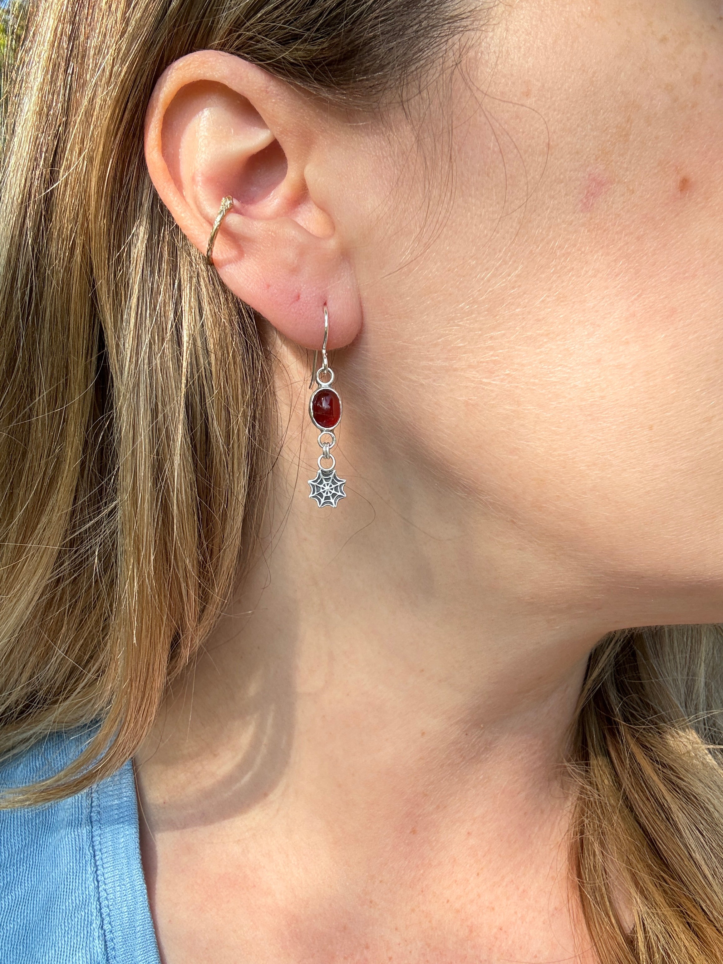 Sterling silver spider web earrings with carnelian. Halloween jewelry
