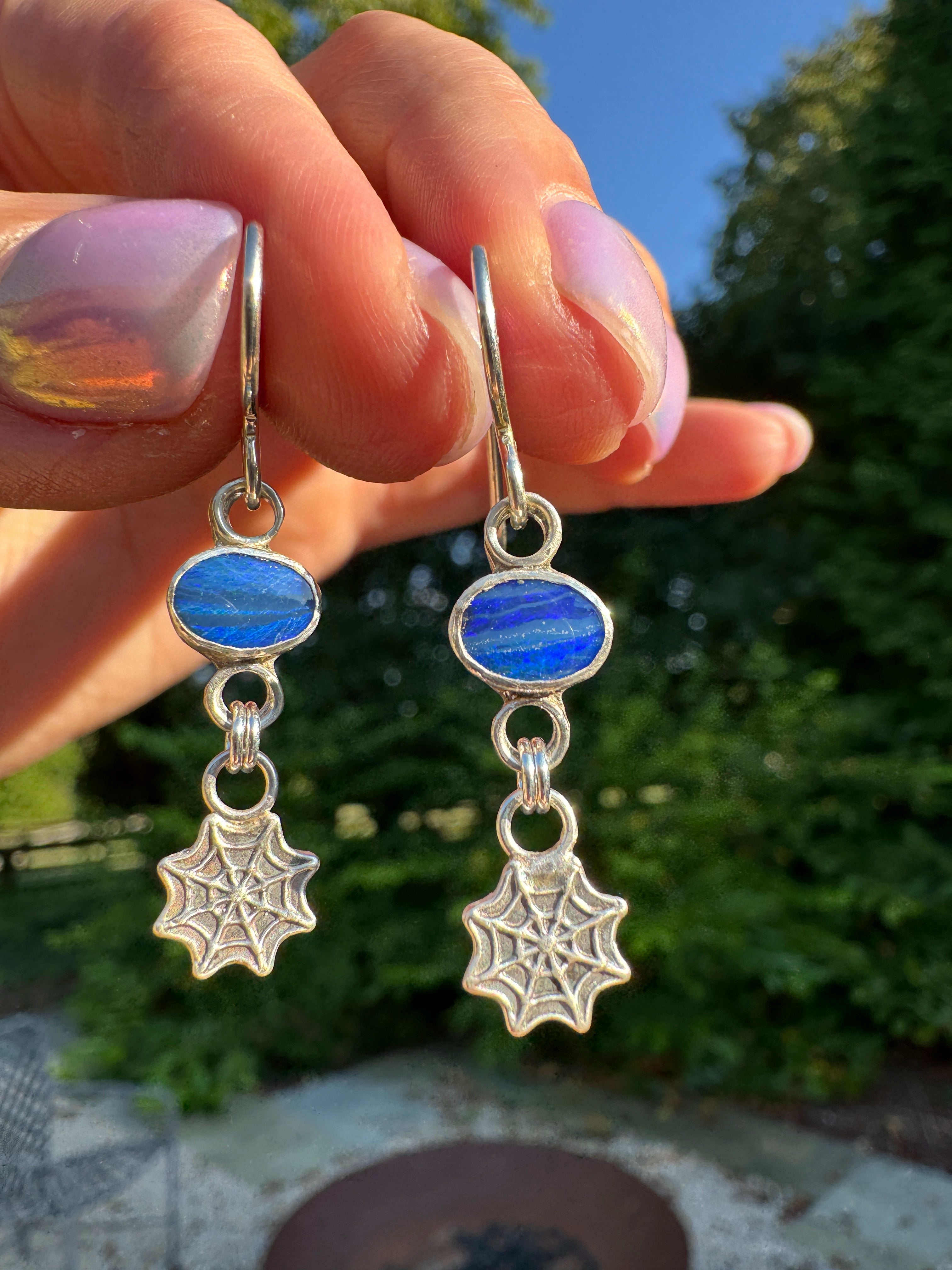 Sterling silver spider web earrings with opal doublets. Halloween jewelry
