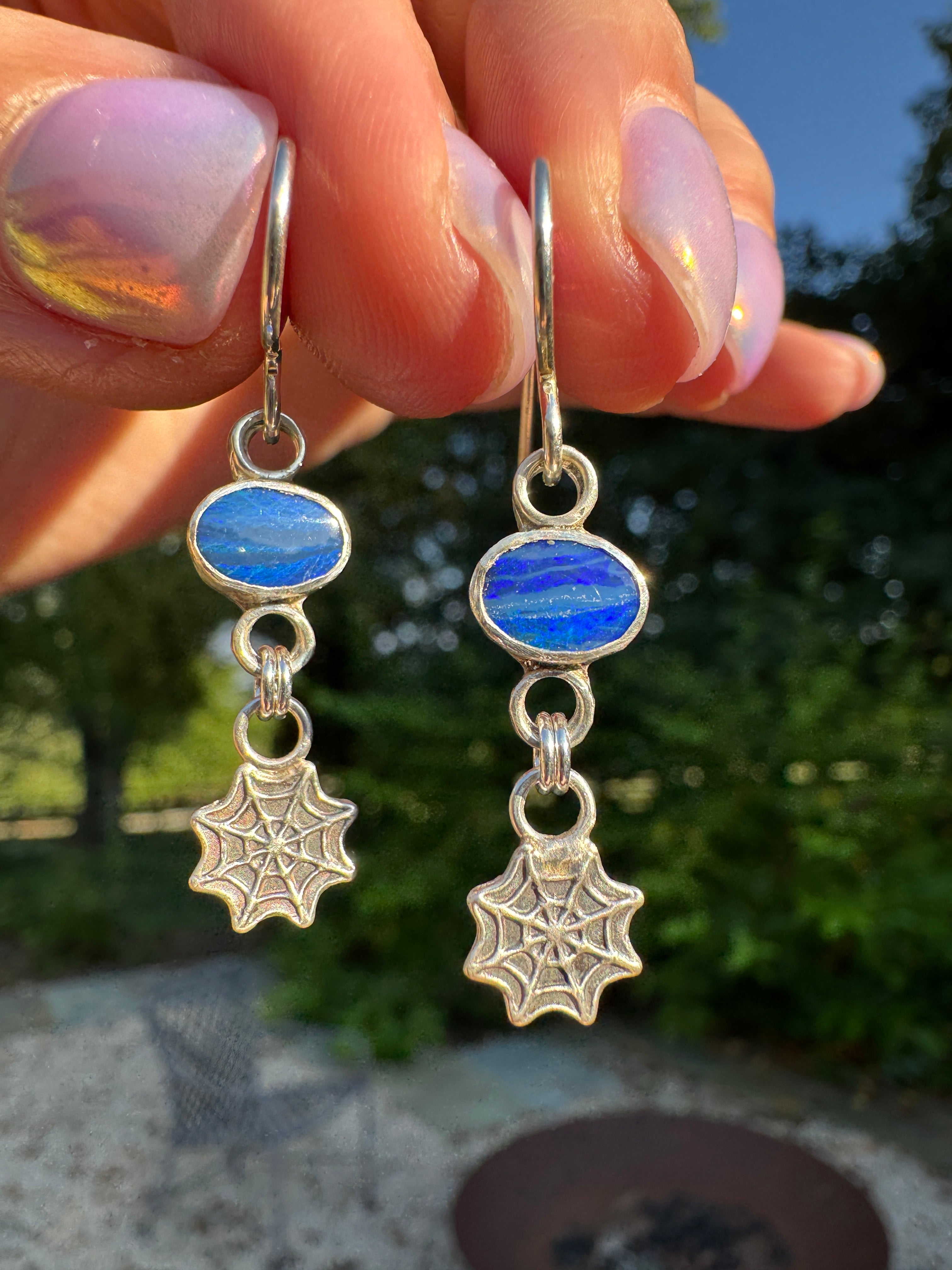 Sterling silver spider web earrings with opal doublets. Halloween jewelry