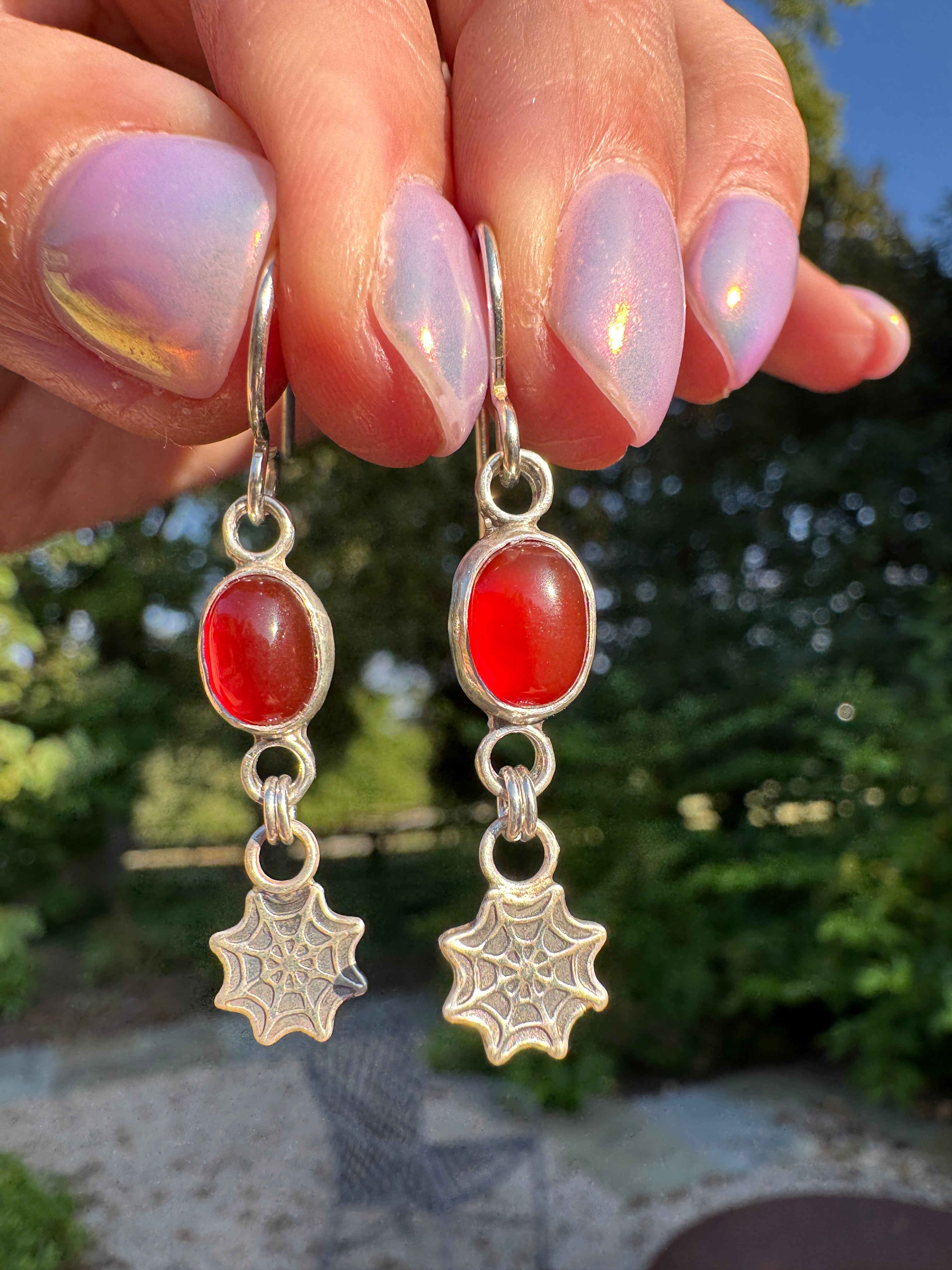 Sterling silver spider web earrings with carnelian. Halloween jewelry