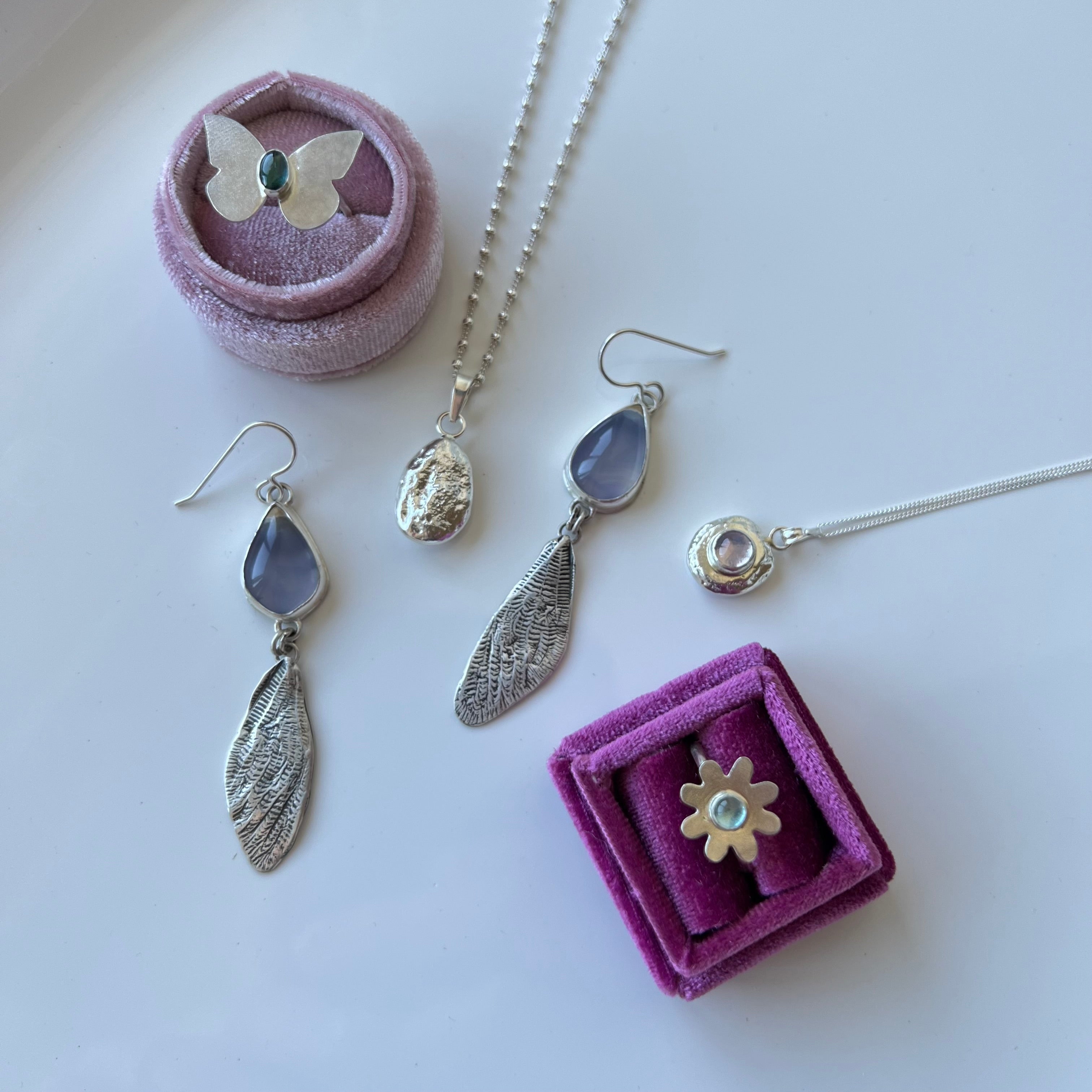 Sterling silver cicada wings with sparkling blue chalcedony. One of a kind pair.