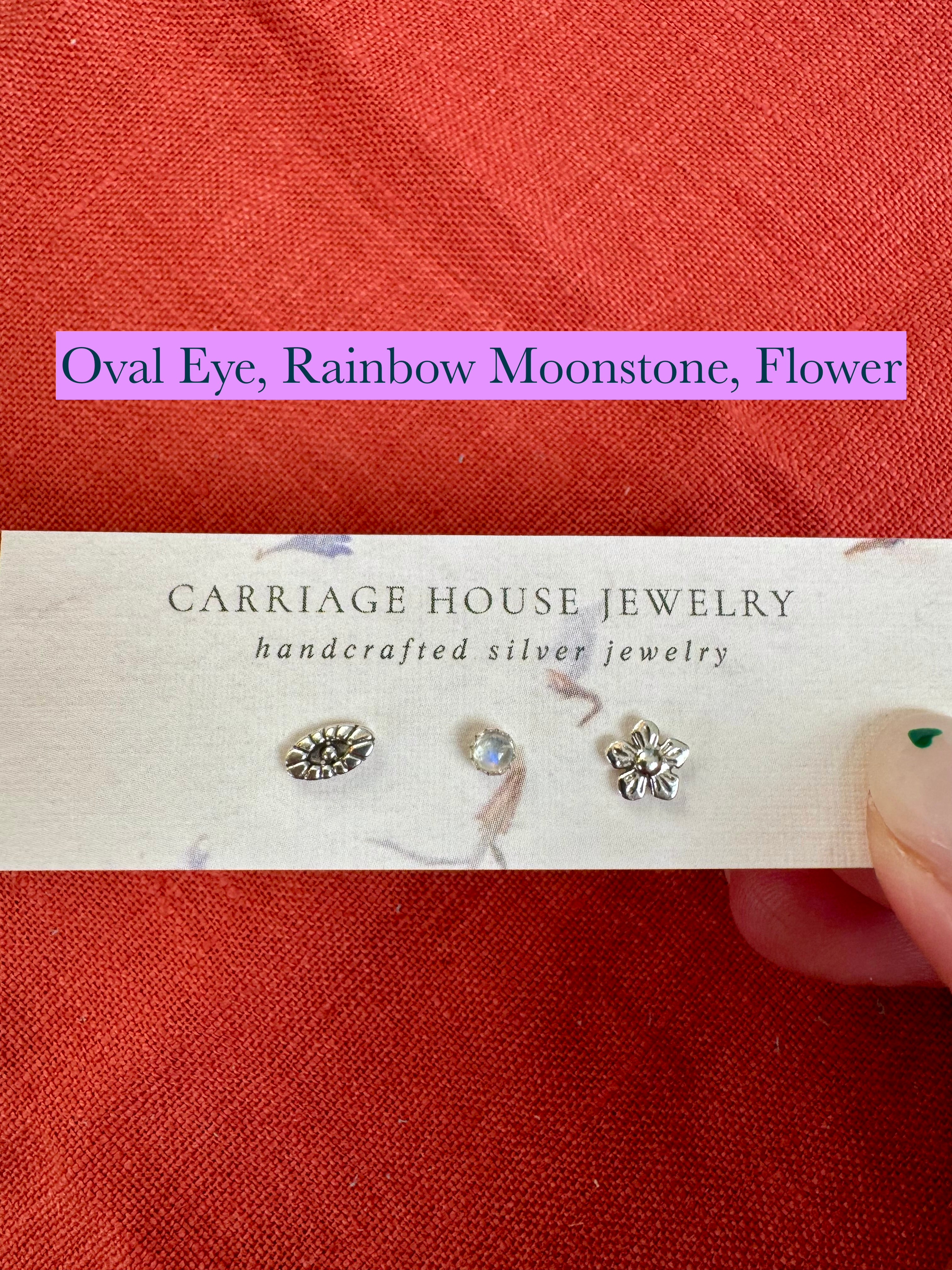 sterling silver oval eye and flower stud earrings with rainbow moonstone stud