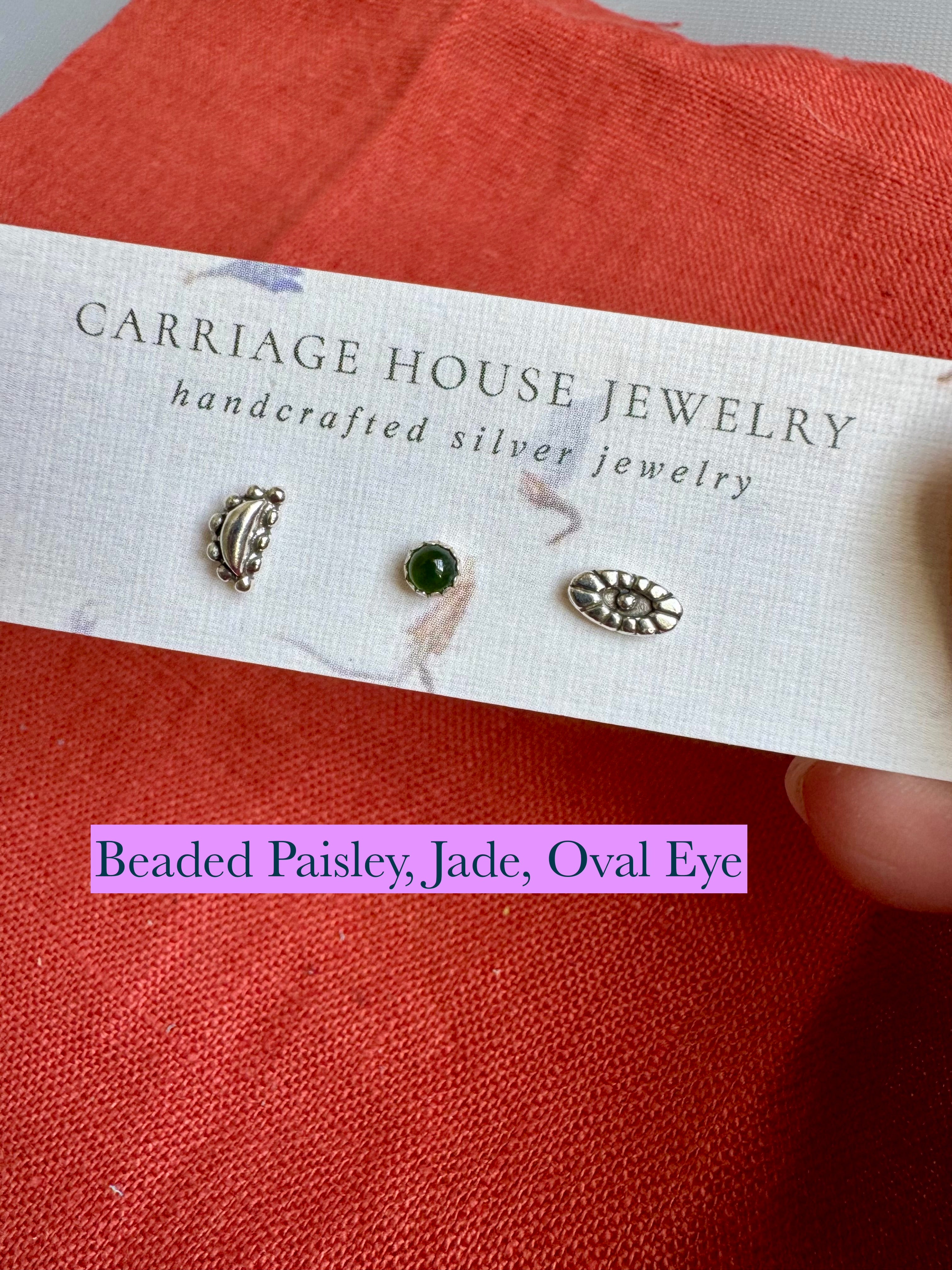 sterling silver paisley-type beaded stud, jade stud, and sterling silver oval eye stud earrings