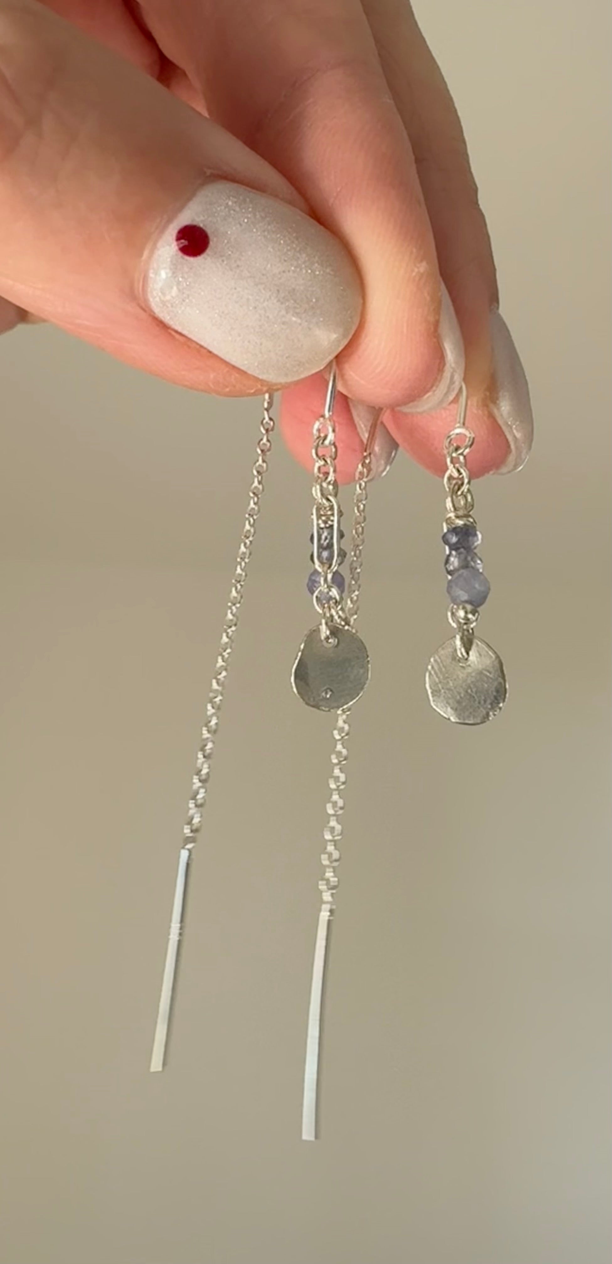 tanzanite and sapphire beads with hand forged sterling silver charms on sterling silver ear threaders