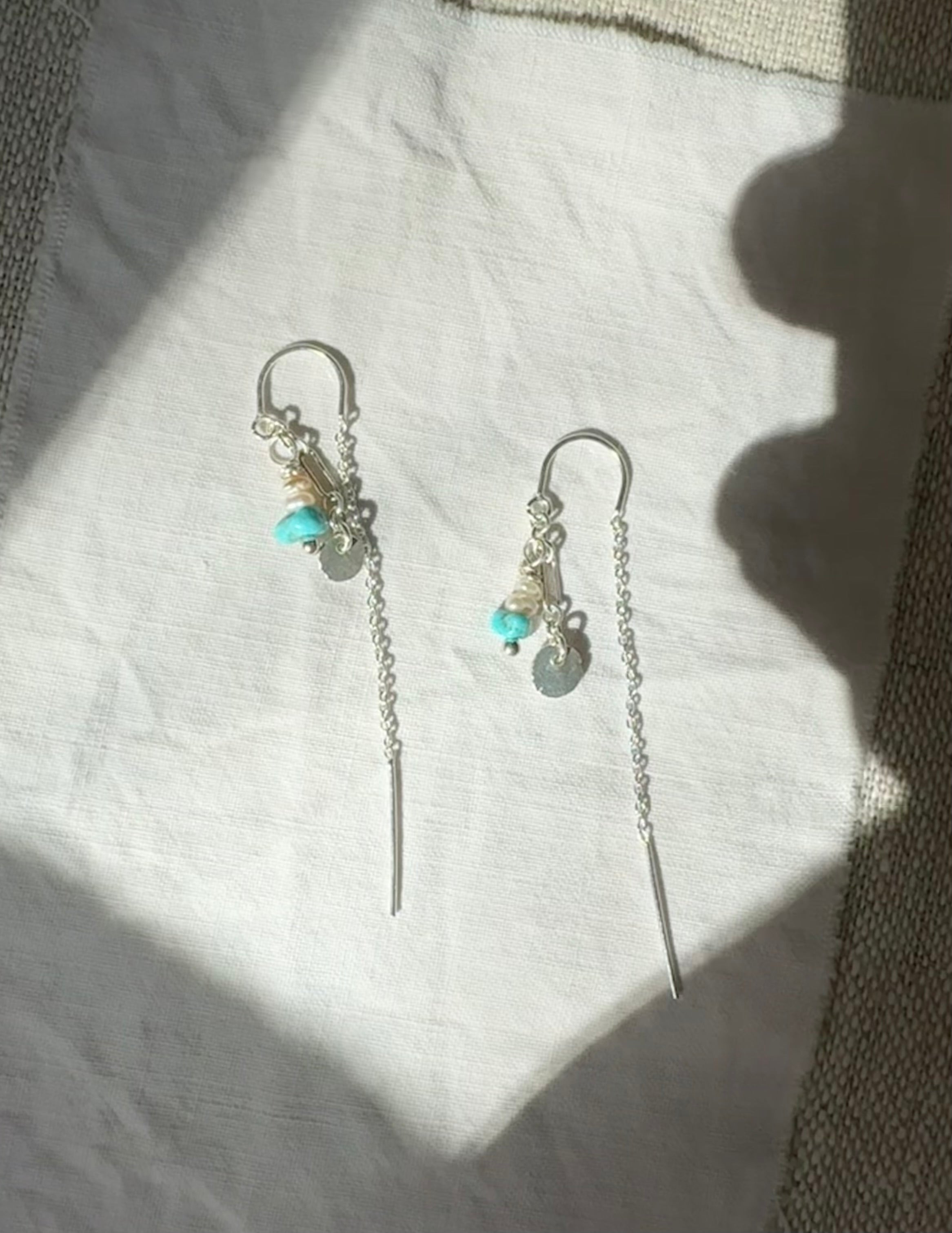 turquoise and pearl beads with hand forged sterling silver charms on sterling silver ear threaders